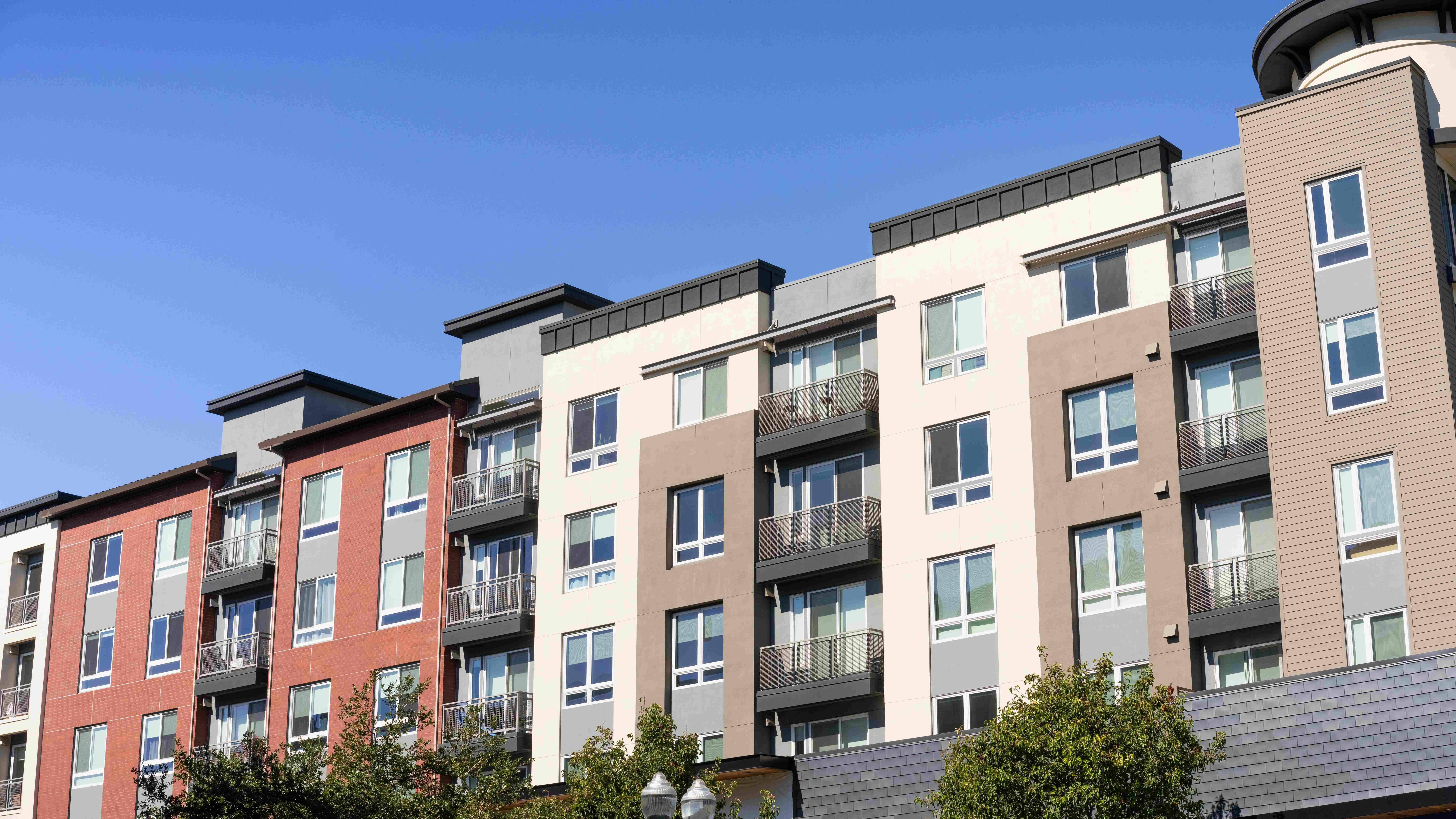 Exterior view of modern apartment building offering